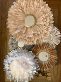 MARLEEN composition all in silver with its feather juju hats and raffia sun mirror