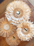 BONIFACIO composition in beige feathers and natural raffia